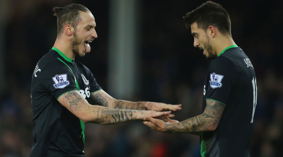 LIVERPOOL, ENGLAND - DECEMBER 28: Marko Arnautovic (L) of Stoke City celebrates scoring his team's fourth goal with his team mate Joselu (R) during the Barclays Premier League match between Everton and Stoke City at Goodison Park on December 28, 2015 in Liverpool, England.  (Photo by Dave Thompson/Getty Images)