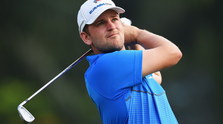 KUALA LUMPUR, MALAYSIA - JANUARY 15:  Bernd Wiesberger of team Europe plays a shot during the first day's fourball matches at the EurAsia Cup presented by DRB-HICOM at Glenmarie G&CC on January 15, 2016 in Kuala Lumpur, Malaysia.  (Photo by Stuart Franklin/Getty Images)