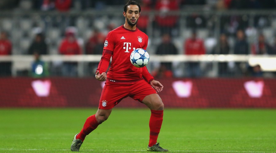 MUNICH, GERMANY - NOVEMBER 24:  Medhi Benatia of Muenchen runs with the ball during the UEFA Champions League Group F match between FC Bayern Muenchen and Olympiacos FC at Allianz Arena on November 24, 2015 in Munich, Germany.  (Photo by Alexander Hassenstein/Bongarts/Getty Images)