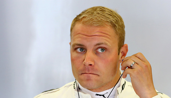 NORTHAMPTON, ENGLAND - JULY 14:  Valtteri Bottas of Finland and Mercedes GP prepares to drive during practice for the Formula One Grand Prix of Great Britain at Silverstone on July 14, 2017 in Northampton, England.  (Photo by Clive Mason/Getty Images)