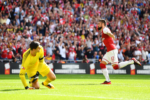 LONDON, ENGLAND - AUGUST 06: Olivier Giroud of Arsenal celebrates scoring his sides fourth penalty in the penalty shoot out during the The FA Community Shield final between Chelsea and Arsenal at Wembley Stadium on August 6, 2017 in London, England.  (Photo by Dan Mullan/Getty Images)