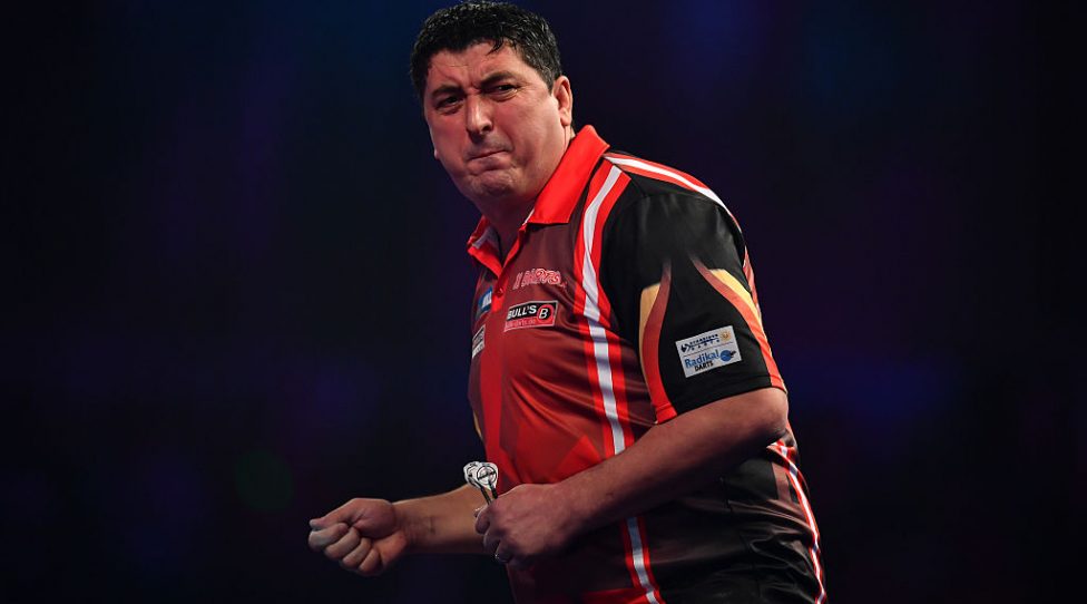 LONDON, ENGLAND - DECEMBER 21:  Mensur Suljovic of Serbia reacts during his first round match against Ron Meulenkamp of the Netherlands on day seven of the 2017 William Hill PDC World Darts Championships at Alexandra Palace on December 21, 2016 in London, England. (Photo by Dan Mullan/Getty Images)