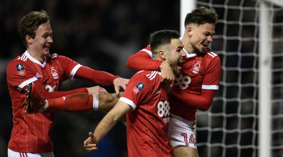 NOTTINGHAM, ENGLAND - JANUARY 07:  Ben Brereton (C) of Nottingham Forest celebrates scoring his team's third goal from the penalty spot with Matthew Cash (R) and Kieran Dowell (L) during The Emirates FA Cup Third Round match between Nottingham Forest and Arsenal at City Ground on January 7, 2018 in Nottingham, England.  (Photo by Laurence Griffiths/Getty Images)