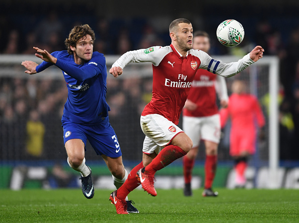 LONDON, ENGLAND - JANUARY 10:  Jack Wilshere of Arsenal breaks past Marcos Alonso of Chelsea during the Carabao Cup Semi-Final First Leg match between Chelsea and Arsenal at Stamford Bridge on January 10, 2018 in London, England.  (Photo by Stuart MacFarlane/Arsenal FC via Getty Images)