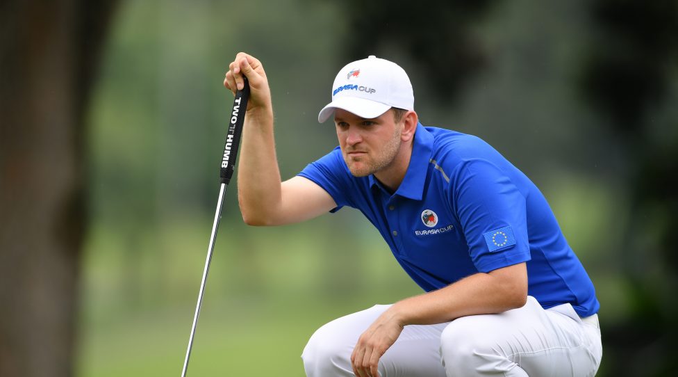 KUALA LUMPUR, MALAYSIA - JANUARY 12:  Bernd Wiesberger of Europe lines up a putt during the fourballs matches on day one of the 2018 EurAsia Cup presented by DRB-HICOM at Glenmarie G&CC on January 12, 2018 in Kuala Lumpur, Malaysia.  (Photo by Stuart Franklin/Getty Images)