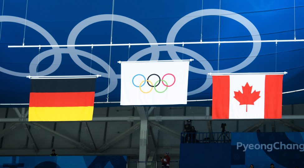 PYEONGCHANG,SOUTH KOREA,25.FEB.18 - OLYMPICS, ICE HOCKEY - Olympic Winter Games PyeongChang 2018, final, Olympic Athletes from Russia vs Germany, men. Image shows the flags of GER, OAR and CAN. Photo: GEPA pictures/ Joel Marklund