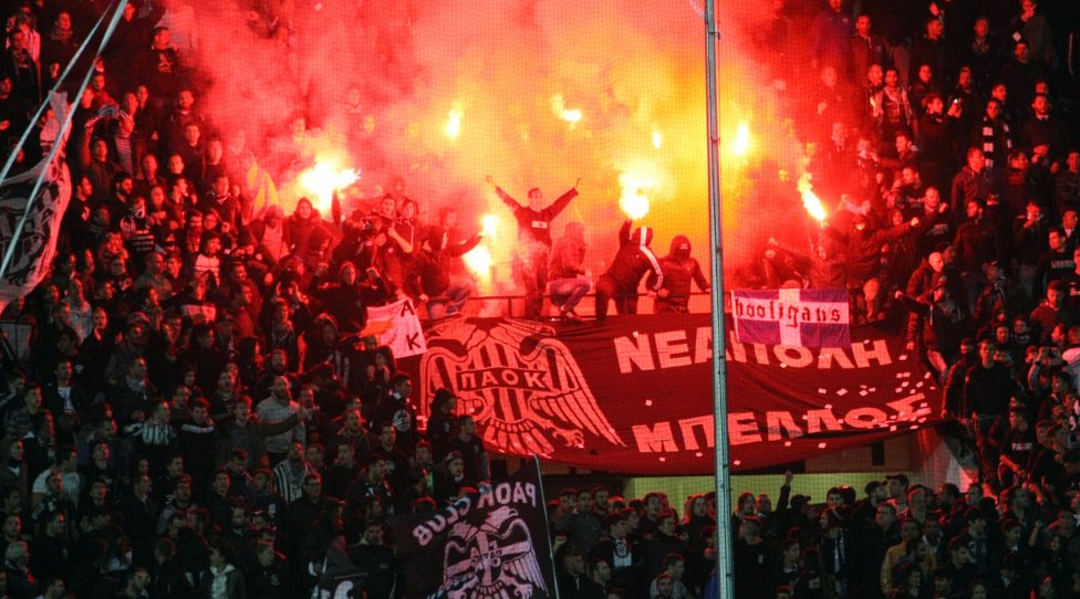 Paok's fans burn flares during the UEFA Europa League group stage football match PAOK FC Thessaloniki vs ACF Fiorentina at Toumpa Stadium in Thessaloniki on October 23, 2014. AFP PHOTO /Sakis Mitrolidis        (Photo credit should read SAKIS MITROLIDIS/AFP/Getty Images)