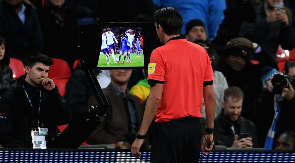 LONDON, ENGLAND - MARCH 27:  Referee Deniz Aytekin checks the VAR during the International friendly between England and Italy at Wembley Stadium on March 27, 2018 in London, England.  (Photo by Laurence Griffiths/Getty Images)