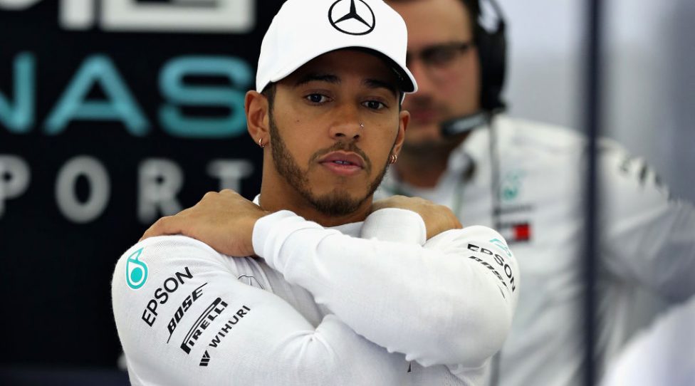 BAHRAIN, BAHRAIN - APRIL 06:  Lewis Hamilton of Great Britain and Mercedes GP looks on in the garage during practice for the Bahrain Formula One Grand Prix at Bahrain International Circuit on April 6, 2018 in Bahrain, Bahrain.  (Photo by Lars Baron/Getty Images)