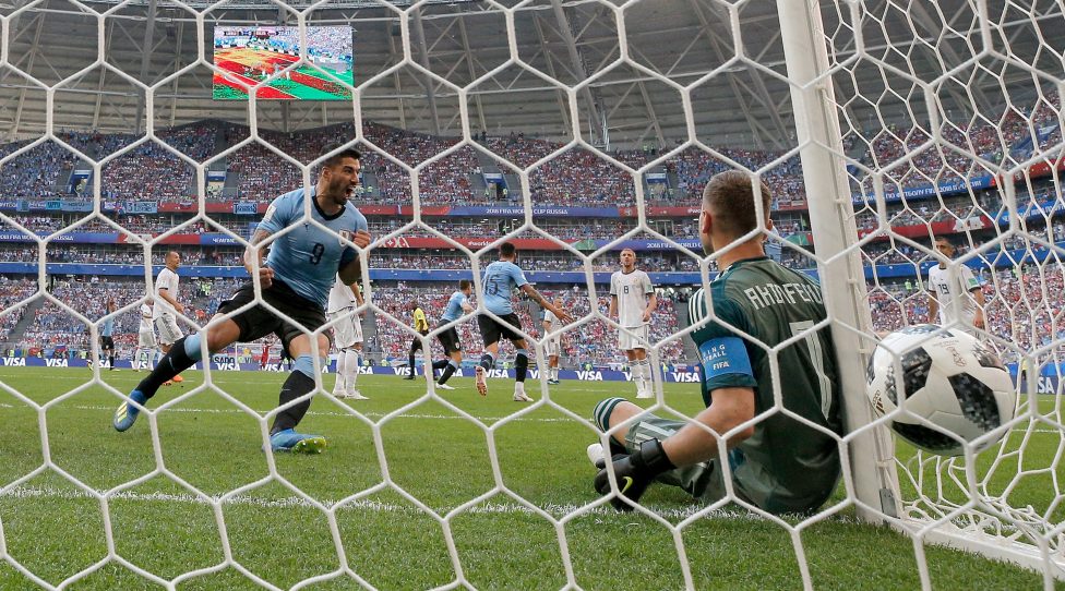 SAMARA, RUSSIA - JUNE 25:  Luis Suarez of Uruguay celebrates after Denis Cheryshev of Russia scores an own goal deflecting Diego Laxalt of Uruguay's shot to put Uruguay infront 2-0 during the 2018 FIFA World Cup Russia group A match between Uruguay and Russia at Samara Arena on June 25, 2018 in Samara, Russia.  (Photo by Dean Mouhtaropoulos/Getty Images)