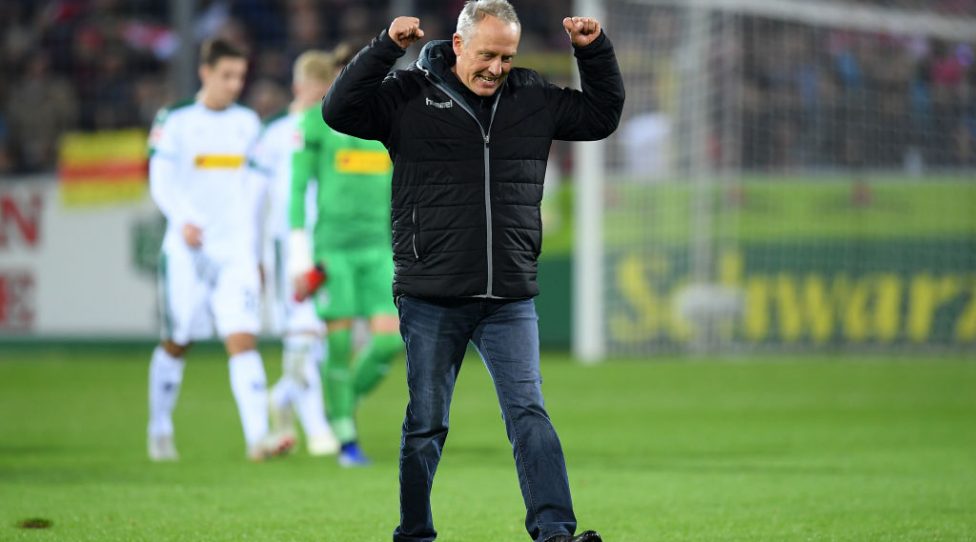 FREIBURG IM BREISGAU, GERMANY - OCTOBER 26: Christian Streich, Head Coach of SC Freiburg celebrates his side's victory at the final whistle during the Bundesliga match between Sport-Club Freiburg and Borussia Moenchengladbach at Schwarzwald-Stadion on October 26, 2018 in Freiburg im Breisgau, Germany. (Photo by Matthias Hangst/Bongarts/Getty Images)