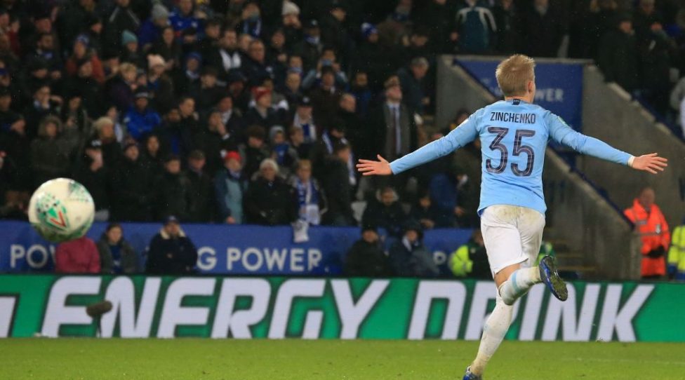Manchester City's Ukrainian midfielder Oleksandr Zinchenko celebrates after scoring the final penalty in the shoot-out during the English League Cup quarter-final football match between Leicester City and Manchester City at King Power Stadium in Leicester, central England on December 18, 2018. - Manchester City won 3-1 on penalties after the game finished 1-1. (Photo by Lindsey PARNABY / AFP) / RESTRICTED TO EDITORIAL USE. No use with unauthorized audio, video, data, fixture lists, club/league logos or 'live' services. Online in-match use limited to 120 images. An additional 40 images may be used in extra time. No video emulation. Social media in-match use limited to 120 images. An additional 40 images may be used in extra time. No use in betting publications, games or single club/league/player publications. /         (Photo credit should read LINDSEY PARNABY/AFP/Getty Images)