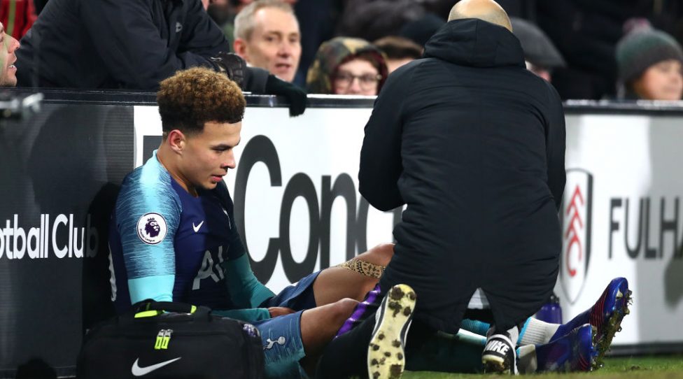 LONDON, ENGLAND - JANUARY 20: Dele Alli of Tottenham reacts to an injury during the Premier League match between Fulham FC and Tottenham Hotspur at Craven Cottage on January 20, 2019 in London, United Kingdom. (Photo by Clive Rose/Getty Images)