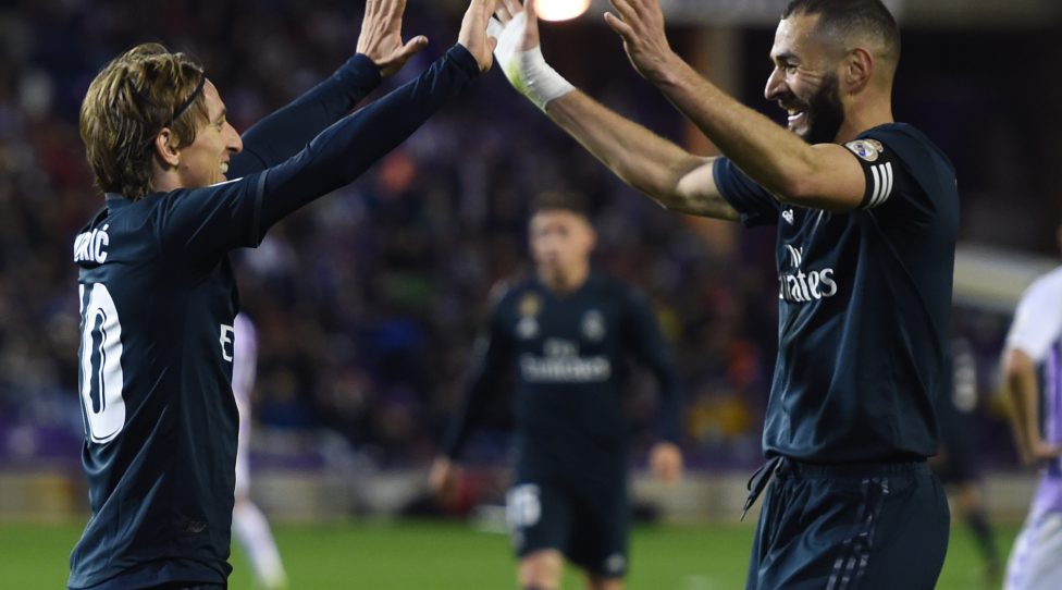 VALLADOLID, SPAIN - MARCH 10:  Luka Modric of Real Madrid celebrates after scoring his team's fourth goal with Karim Benzema during the La Liga match between Real Valladolid CF and Real Madrid CF at Jose Zorrilla on March 10, 2019 in Valladolid, Spain. (Photo by Denis Doyle/Getty Images)