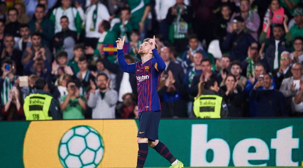 SEVILLE, SPAIN - MARCH 17: Lionel Messi of FC Barcelona celebrates after scoring his team's fourth goal during the La Liga match between Real Betis Balompie and FC Barcelona at Estadio Benito Villamarin on March 17, 2019 in Seville, Spain. (Photo by Aitor Alcalde/Getty Images)