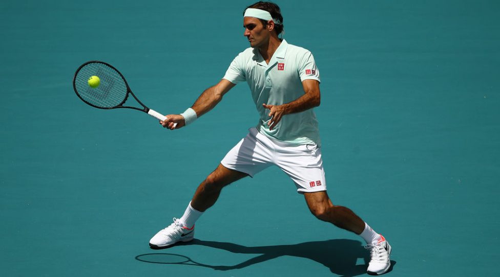 MIAMI GARDENS, FLORIDA - MARCH 31: Roger Federer of Switzerland in action against John Isner of USA in the final during day fourteen of the Miami Open tennis on March 31, 2019 in Miami Gardens, Florida. (Photo by Julian Finney/Getty Images)