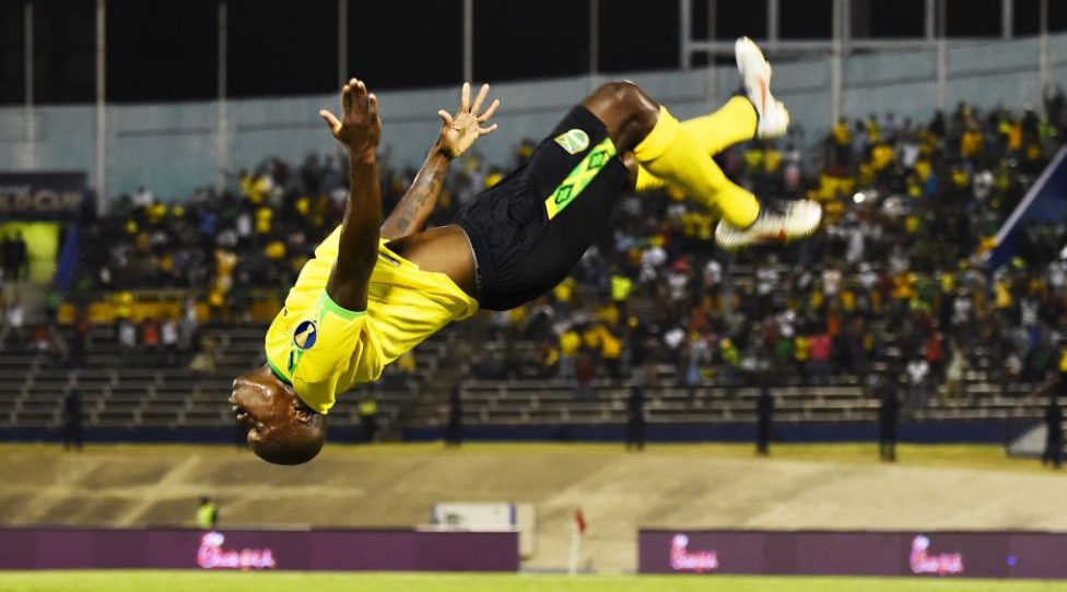 Jamaica's Dever Orgill does a flip as he celebrates after scoring a goal during the 2019 Concacaf Gold Cup match between Jamaica and Honduras, on June 17, 2019 at Independence Park in Kingston. (Photo by CHANDAN KHANNA / AFP)        (Photo credit should read CHANDAN KHANNA/AFP/Getty Images)