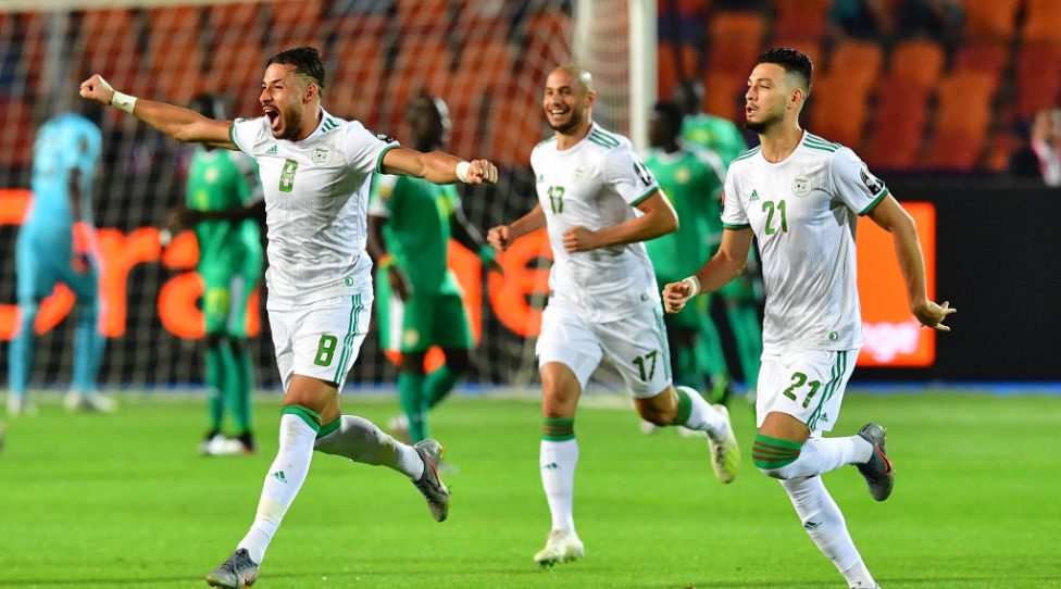 Algeria's forward Baghdad Bounedjah celebrates after scoring a goal during the 2019 Africa Cup of Nations (CAN) Final football match between Senegal and Algeria at the Cairo International Stadium in Cairo on July 19, 2019. (Photo by Giuseppe CACACE / AFP)        (Photo credit should read GIUSEPPE CACACE/AFP/Getty Images)