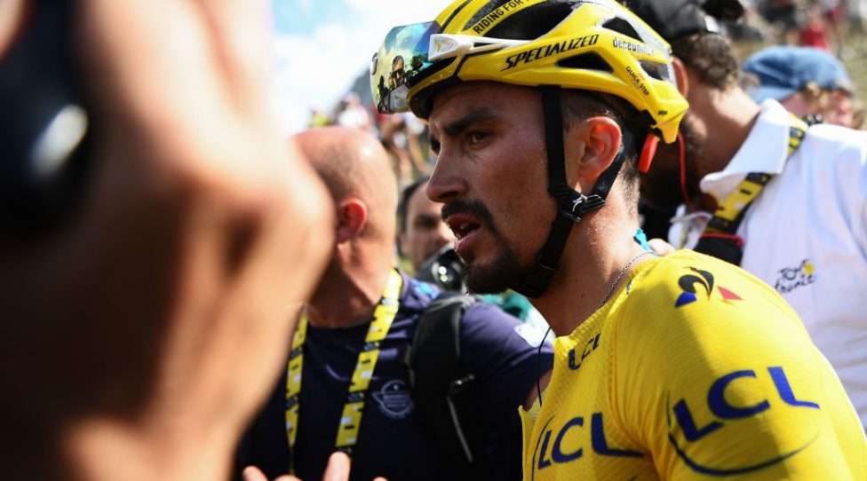 TOPSHOT - France's Julian Alaphilippe, wearing the overall leader's yellow jersey reacts after crossing the finish line of the fourteenth stage of the 106th edition of the Tour de France cycling race between Tarbes and Tourmalet Bareges, in Tourmalet Bareges on July 20, 2019. (Photo by Anne-Christine POUJOULAT / AFP)        (Photo credit should read ANNE-CHRISTINE POUJOULAT/AFP/Getty Images)