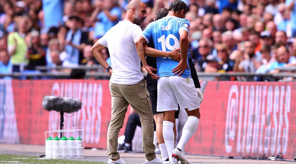 LONDON, ENGLAND - AUGUST 04: Leroy Sane of Manchester City is comforted by Manchester City manager Josep Guardiola after being substituted during the FA Community Shield match between Liverpool and Manchester City at Wembley Stadium on August 04, 2019 in London, England. (Photo by Chris Brunskill/Fantasista/Getty Images)