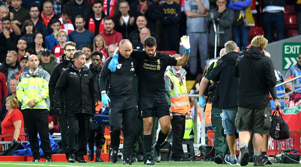 LIVERPOOL, ENGLAND - AUGUST 09: Alisson Becker of Liverpool leaves the pitch following an injury during the Premier League match between Liverpool FC and Norwich City at Anfield on August 09, 2019 in Liverpool, United Kingdom. (Photo by Michael Regan/Getty Images)