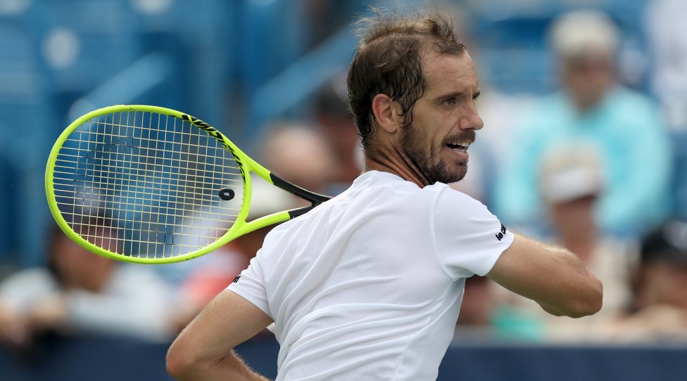 MASON, OHIO - AUGUST 12: Richard Gasquet of France returns a shot to Andy Murray of Great Britain during Day 3 of the Western and Southern Open at Lindner Family Tennis Center on August 12, 2019 in Mason, Ohio. (Photo by Rob Carr/Getty Images)