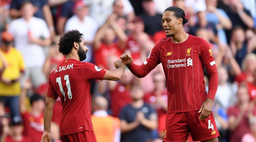 LIVERPOOL, ENGLAND - AUGUST 24: Mohamed Salah of Liverpool celebrates with Virgil van Dijk after scoring his team's second goal during the Premier League match between Liverpool FC and Arsenal FC at Anfield on August 24, 2019 in Liverpool, United Kingdom. (Photo by Laurence Griffiths/Getty Images)