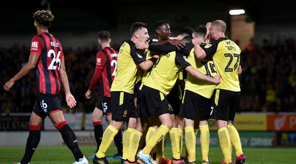 BURTON-UPON-TRENT, ENGLAND - SEPTEMBER 25: Oliver Sarkic of Burton Albion (obscured) celebrates with teammates after scoring his team's first goal during the Carabao Cup Third Round match between Burton Albion and AFC Bournemouth at Pirelli Stadium on September 25, 2019 in Burton-upon-Trent, England. (Photo by Nathan Stirk/Getty Images)