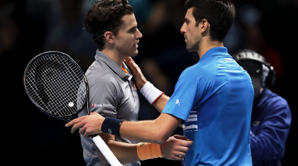 LONDON, ENGLAND - NOVEMBER 12: Dominic Thiem of Austria shakes hands at the net with Novak Djokovic of Serbia after their singles match during Day Three of the Nitto ATP World Tour Finals at The O2 Arena on November 12, 2019 in London, England. (Photo by Julian Finney/Getty Images)