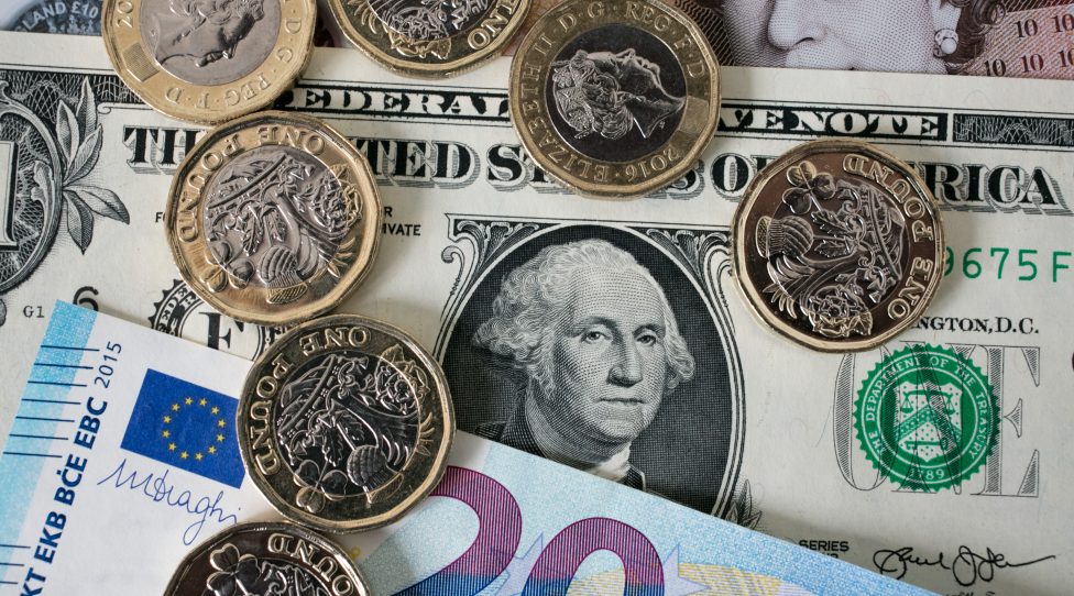 BATH, ENGLAND - OCTOBER 13:  In this photo illustration, £1 coins are seen with the new £10 note alongside euro notes and US dollar bills on October 13, 2017 in Bath, England. Currency experts have warned that as the uncertainty surrounding Brexit continues, the value of the British pound, which has remained depressed against the US dollar and the euro since the UK voted to leave in the EU referendum, is likely to fluctuate.  (Photo Illustration by Matt Cardy/Getty Images)