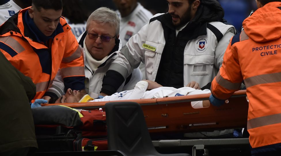TOPSHOT - Lyon's French forward  Martin Terrier leaves the pitch on a stretcher during the French L1 football match between Lyon (OL) and Toulouse (TFC) on January 26, 2020 at the Groupama stadium in Décines-Charpieu near Lyon, southeastern France. (Photo by JEAN-PHILIPPE KSIAZEK / AFP) (Photo by JEAN-PHILIPPE KSIAZEK/AFP via Getty Images)