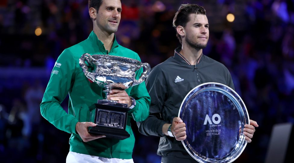 MELBOURNE, AUSTRALIA - FEBRUARY 02: Novak Djokovic of Serbia and Dominic Thiem of Austria pose for a photo following their Men's Singles Final on day fourteen of the 2020 Australian Open at Melbourne Park on February 02, 2020 in Melbourne, Australia. (Photo by Cameron Spencer/Getty Images)
