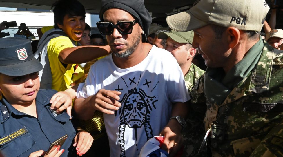 Brazilian ex-football star Ronaldinho Gaucho arrives at Silvio Pettirossi International Airport in Luque, near Asuncion, on March 4, 2020. - Ronaldinho arrived in Paraguay to present his latest book "Genio en la Vida" and a health programme for girls and boys. (Photo by Norberto DUARTE / AFP) (Photo by NORBERTO DUARTE/AFP via Getty Images)