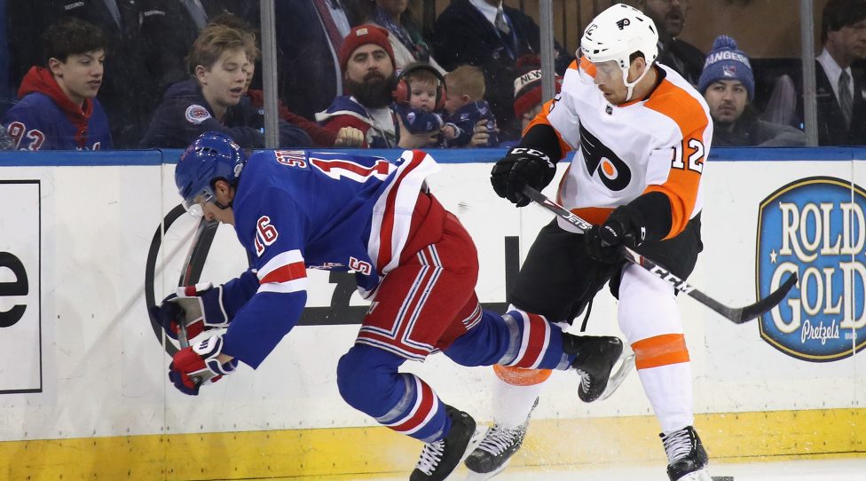 NEW YORK, NEW YORK - MARCH 01: Ryan Strome #16 of the New York Rangers is checked by Michael Raffl #12 of the Philadelphia Flyers during the second period at Madison Square Garden on March 01, 2020 in New York City. (Photo by Bruce Bennett/Getty Images)