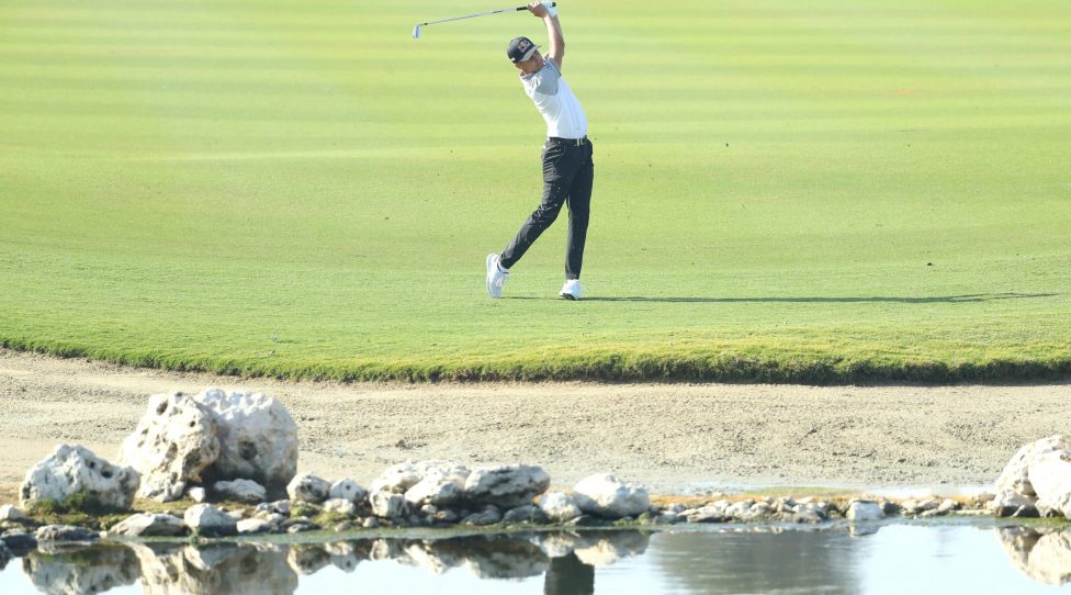 DOHA, QATAR - MARCH 06: Matthias Schwab of Austria plays his second shot on the 13th hole during Day 2 of the Commercial Bank Qatar Masters at Education City Golf Club on March 06, 2020 in Doha, Qatar. (Photo by Warren Little/Getty Images)