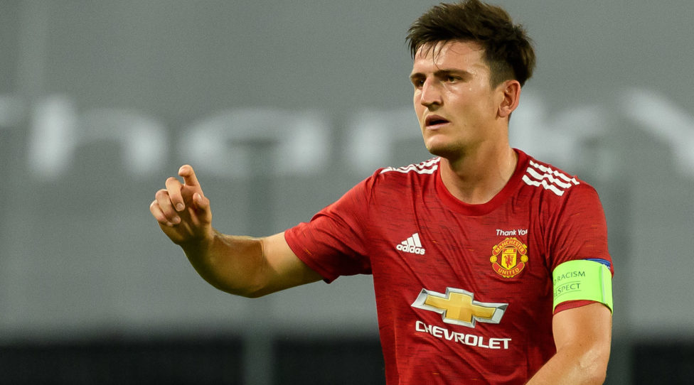 COLOGNE, GERMANY - AUGUST 10: (BILD ZEITUNG OUT) Harry Maguire of Manchester United gestures during the UEFA Europa League Quarter Final between Manchester United and FC Kobenhavn at RheinEnergieStadion on August 10, 2020 in Cologne, Germany. (Photo by Alex Gottschalk/DeFodi Images via Getty Images)