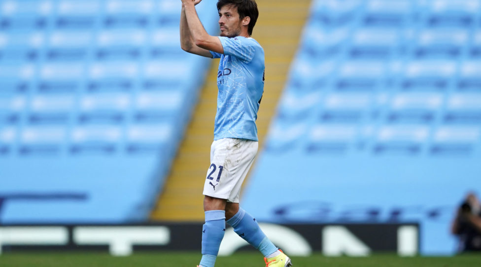 MANCHESTER, ENGLAND - JULY 26: David Silva of Manchester City applauds as he is substituted during the Premier League match between Manchester City and Norwich City at Etihad Stadium on July 26, 2020 in Manchester, England.Football Stadiums around Europe remain empty due to the Coronavirus Pandemic as Government social distancing laws prohibit fans inside venues resulting in all fixtures being played behind closed doors. (Photo by Dave Thompson/Pool via Getty Images)