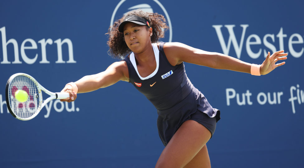 NEW YORK, NEW YORK - AUGUST 26:  Naomi Osaka of Japan returns a shot against Anett Kontaveit of Estonia during the Western & Southern Open at the USTA Billie Jean King National Tennis Center on August 26, 2020 in New York City. (Photo by Al Bello/Getty Images)