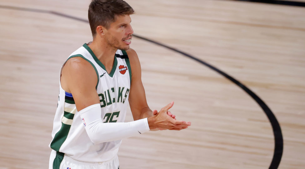 LAKE BUENA VISTA, FLORIDA - AUGUST 29: Kyle Korver #26 of the Milwaukee Bucks reacts after shooting a three point basket against the Orlando Magic during the second quarter in Game Five of the Eastern Conference First Round during the 2020 NBA Playoffs at AdventHealth Arena at ESPN Wide World Of Sports Complex on August 29, 2020 in Lake Buena Vista, Florida. NOTE TO USER: User expressly acknowledges and agrees that, by downloading and or using this photograph, User is consenting to the terms and conditions of the Getty Images License Agreement.  (Photo by Kevin C. Cox/Getty Images)