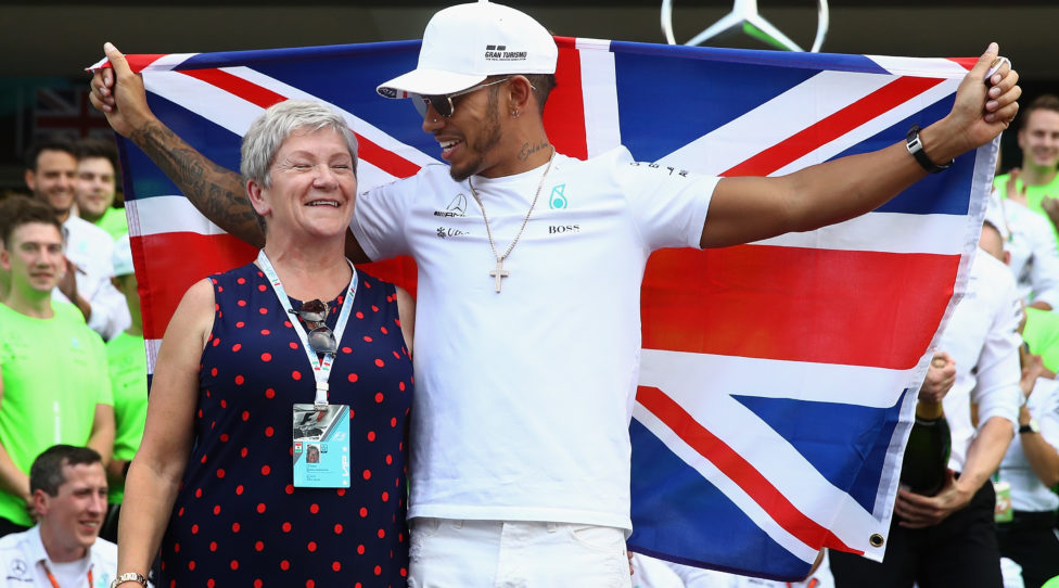 MEXICO CITY, MEXICO - OCTOBER 29:  Lewis Hamilton of Great Britain and Mercedes GP celebrates with his mother Carmen Larbalestier after winning his fourth F1 World Drivers Championship after the Formula One Grand Prix of Mexico at Autodromo Hermanos Rodriguez on October 29, 2017 in Mexico City, Mexico.  (Photo by Clive Mason/Getty Images)