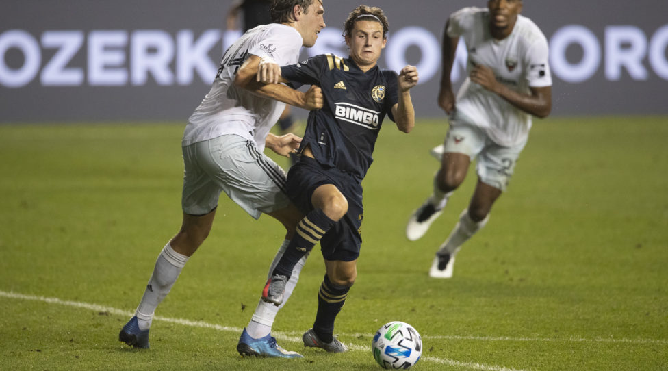 CHESTER, PA - AUGUST 29: Brenden Aaronson #22 of Philadelphia Union competes for the ball against Axel Sjoberg #44 of D.C. United at Subaru Park on August 29, 2020 in Chester, Pennsylvania. The Philadelphia Union defeated D.C. United 4-1. (Photo by Mitchell Leff/Getty Images)