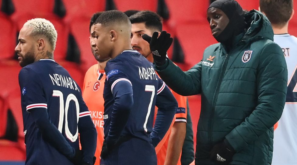 Istanbul Basaksehir's French forward Demba Ba (R) gestures past Paris Saint-Germain's Brazilian forward Neymar (L) and Paris Saint-Germain's French forward Kylian Mbappe after the game was suspended amid allegations of racism by one of the match officials during the UEFA Champions League group H football match between Paris Saint-Germain (PSG) and Istanbul Basaksehir FK at the Parc des Princes stadium in Paris, on December 8, 2020. - Paris Saint-Germain's decisive Champions League game with Istanbul Basaksehir was suspended today in the first half as the players walked off amid allegations of racism by one of the match officials.
The row erupted after Basaksehir assistant coach Pierre Webo, the former Cameroon international, was shown a red card during a fierce row on the touchline with staff from the Turkish club appearing to accuse the Romanian fourth official of using a racist term. (Photo by FRANCK FIFE / AFP) (Photo by FRANCK FIFE/AFP via Getty Images)
