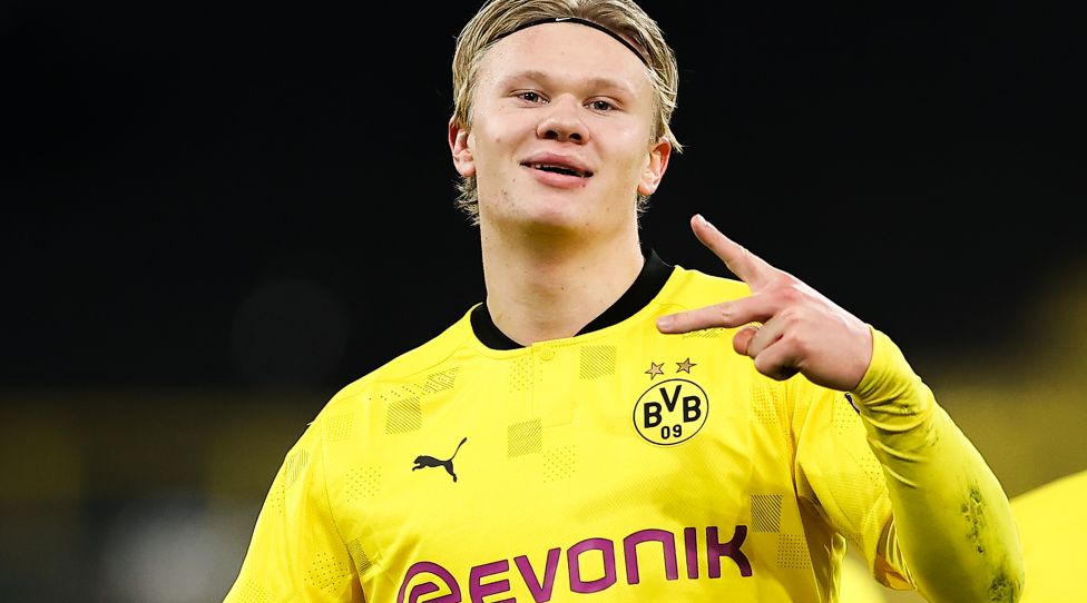 DORTMUND, GERMANY - NOVEMBER 24: Erling Haaland of Borussia Dortmund celebrates after scoring their sides third goal during the UEFA Champions League Group F stage match between Borussia Dortmund and Club Brugge KV at Signal Iduna Park on November 24, 2020 in Dortmund, Germany. Sporting stadiums around Germany remain under strict restrictions due to the Coronavirus Pandemic as Government social distancing laws prohibit fans inside venues resulting in games being played behind closed doors. (Photo by Lars Baron/Getty Images)