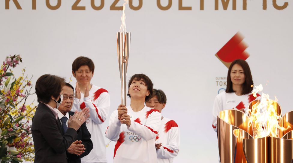 210325 -- FUKUSHIMA, March 25, 2021 -- Tokyo 2020 Organizing Committee President Hashimoto Seiko L, front applauds next to Iwashimizu Azusa R, front, former member of Nadeshiko Japan , the Japan women s National Football Team, on the first day of the Tokyo 2020 Olympic torch relay at J-Village National Training Center in Futaba, Fukushima of Japan, on March 25, 2021. /Pool via Xinhua SPJAPAN-FUKUSHIMA-TOKYO 2020-TORCH-RELAY KimxKyung-Hoon PUBLICATIONxNOTxINxCHN