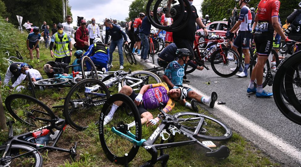 A rider of Alpecin-Fenix and French Bryan Coquard of BB Hotels P/B KTM pictured after a fall during the first stage of the 108th edition of the Tour de France cycling race, 197,8km from Brest to Landerneau, France, . This year s Tour de France takes place from 26 June to 18 July 2021. POOLxANNE-CHRISTINExPOUJOULAT PUBLICATIONxINxGERxSUIxAUTxONLY x3019231x
