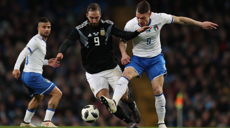 Gonzalo Higuain of Argentina tackled by Andrea Belotti of Italy during the International Friendly Länderspiel match at the Etihad Stadium, Manchester. Picture date: 23rd March 2018. Picture credit should read: Simon Bellis/Sportimage PUBLICATIONxNOTxINxUK