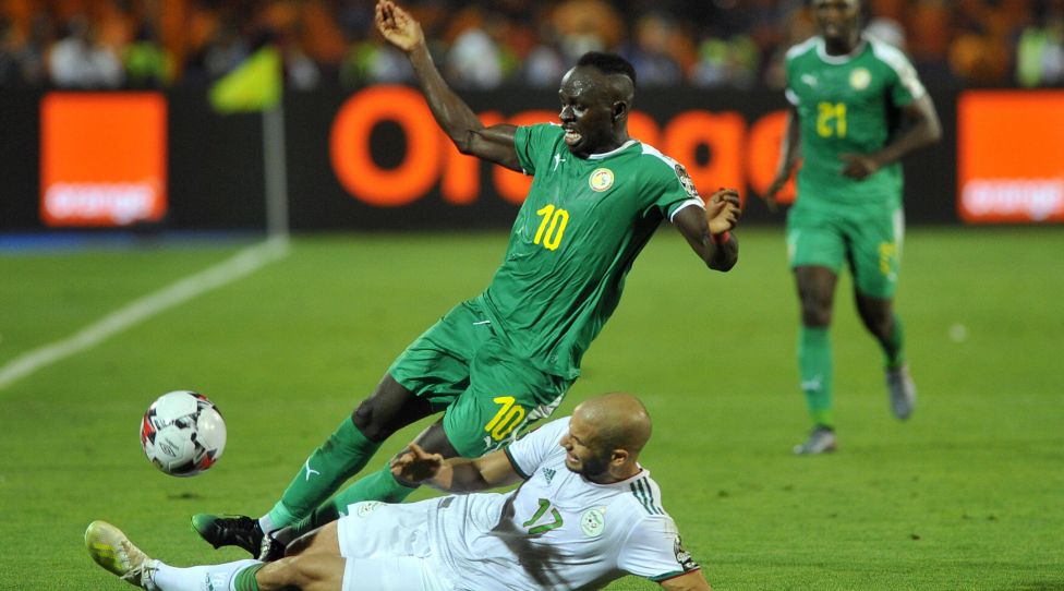 July 19, 2019 - Cairo, Egypt - Senegal s forward Sadio Mane (L) is tackled by Algeria s midfielder Adlene Guedioura during the 2019 Africa Cup of Nations (CAN) Final football match between Senegal and Algeria at the Cairo International Stadium in Cairo on July 19, 2019. Senegal Vs Algeria - 2019 Africa Cup Of Nations PUBLICATIONxINxGERxSUIxAUTxONLY - ZUMAn230 20190719_zaa_n230_477 Copyright: xMohamedxMostafax