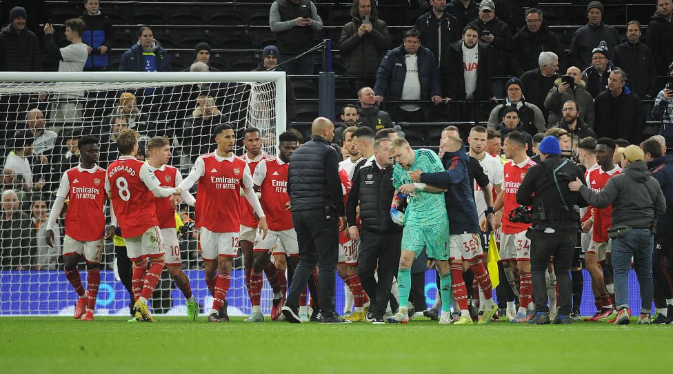 Football - 2022 / 2023 Premier League - Tottenham Hotspur vs Arsenal - Tottenham Hotspur Stadium - Sunday 15th January 2023 Arsenal goalkeeper, Aaron Ramsdale is pulled away by Arsenal staff after an incident at the final whistle PUBLICATIONxNOTxINxUK